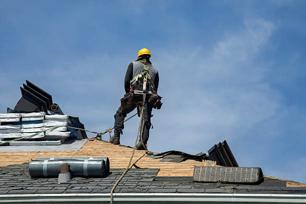 Professional Roofing technician working in Armington, IL
